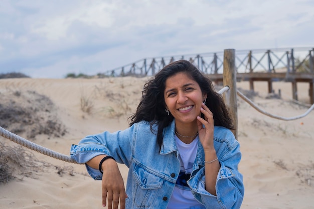 Young indian woman happy in beach