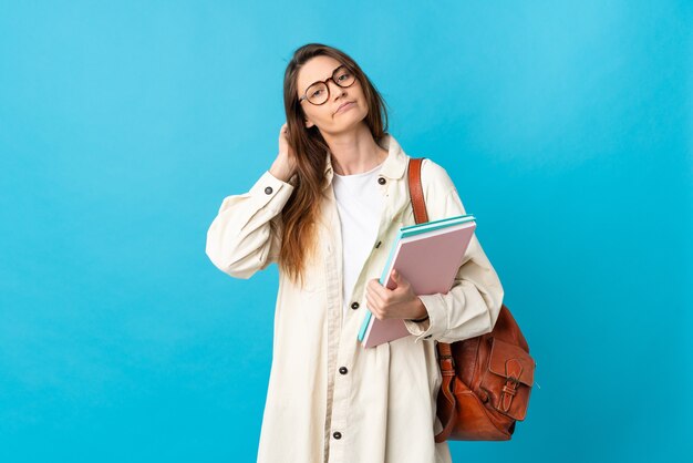 Young Ireland student woman over isolated background having doubts