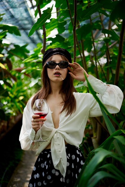 Young lady drinking wine