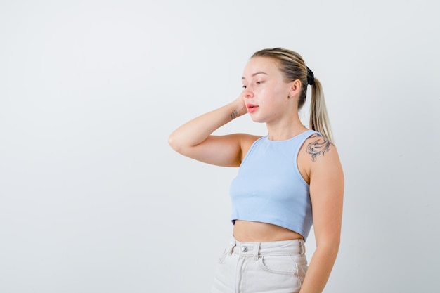 young lady is phoning somebody on white background