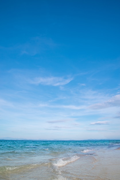 Young lady relaxing in a chair on a beach at sunny day