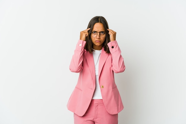 Young latin business woman isolated on white wall showing a welcome expression