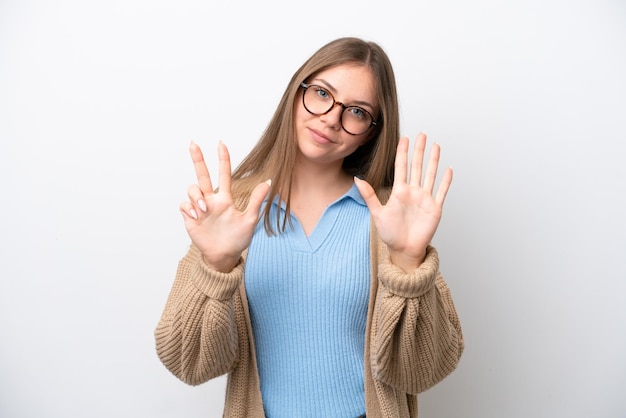 Young Lithuanian woman isolated on white background counting eight with fingers