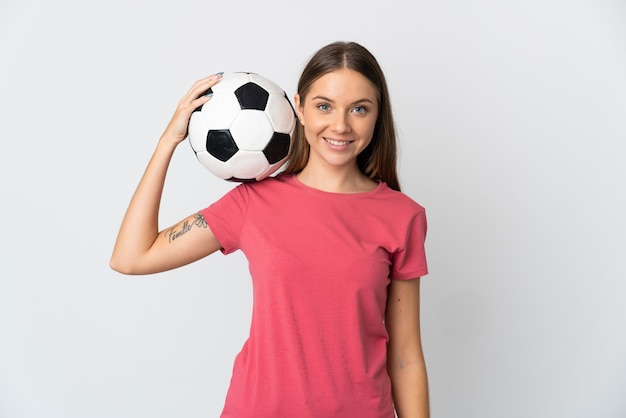 Young Lithuanian woman isolated on white wall with soccer ball