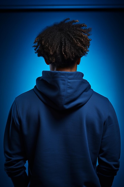 Photo young male model wearing deep blue hoodie