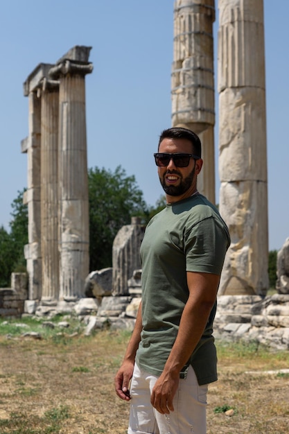 Young male tourist at the ancient ruins of Aphrodisia Turkey