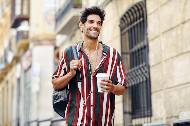 Young male traveler enjoying the streets of Granada, Spain.