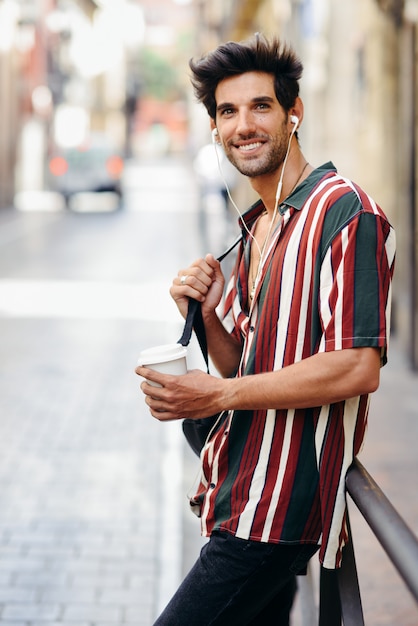 Young male traveler enjoying the streets of Granada, Spain.