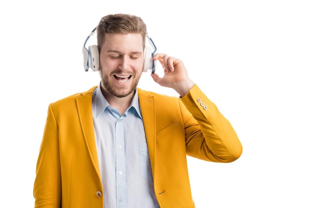 Young male with headphones in studio