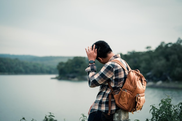 Young man backpack traveling on the holiday selective and soft focus