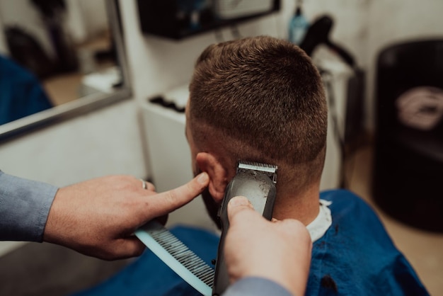 Young Man in Barbershop Hair Care Service Concept Selective focus High quality photo