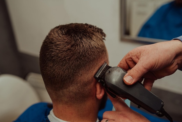 Young Man in Barbershop Hair Care Service Concept Selective focus High quality photo