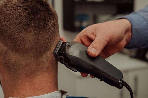 Young Man in Barbershop Hair Care Service Concept Selective focus High quality photo