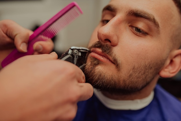 Young Man in Barbershop Hair Care Service Concept Selective focus High quality photo