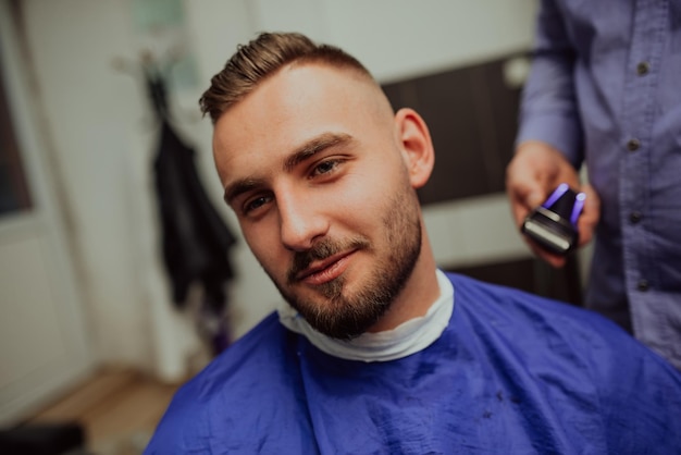 Young Man in Barbershop Hair Care Service Concept Selective focus High quality photo