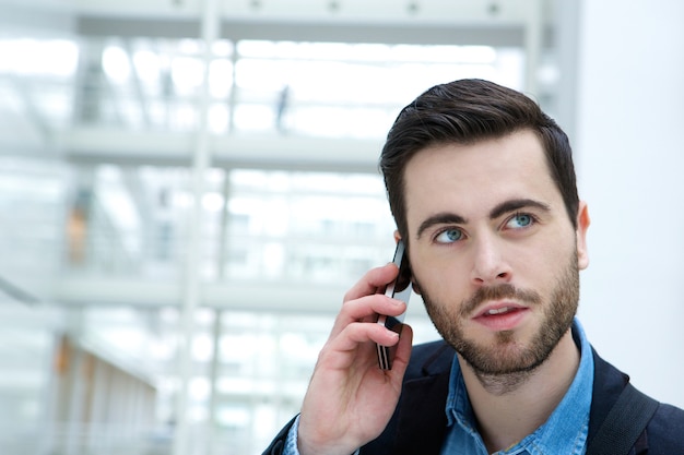 Young man calling by cellphone