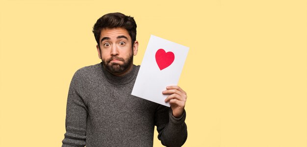 Young man celebrating valentines day