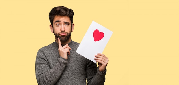 Young man celebrating valentines day