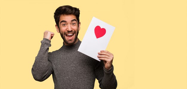 Young man celebrating valentines day