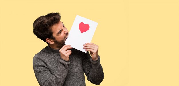 Young man celebrating valentines day