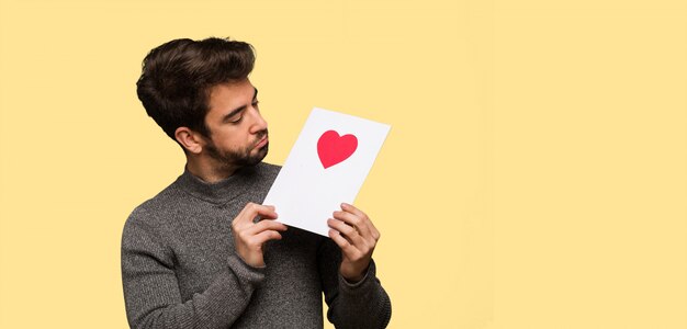 Young man celebrating valentines day