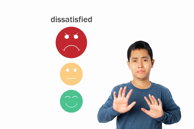 Young man choosing sadness emotion face screen bad service dislike bad quality low rating social media not good Concept of customer experience dissatisfied