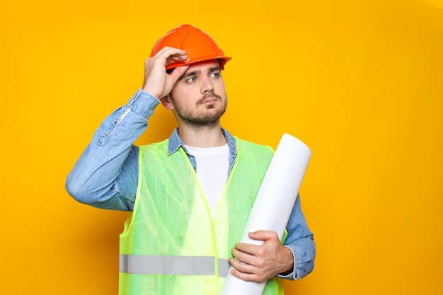 Young man civil engineer in safety hat