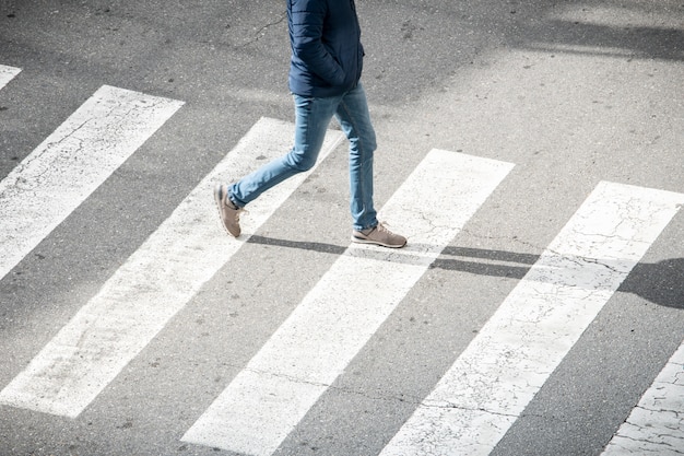 Young man on crosswalk