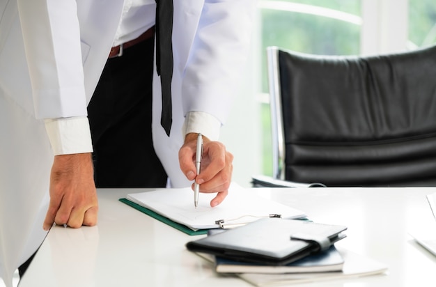 Young man doctor working at office in hospital.