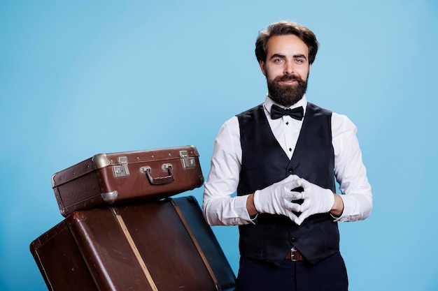 Young man hotel concierge with gloves