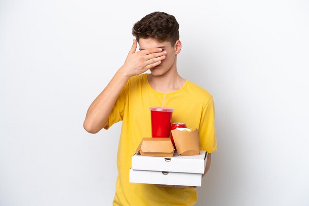 Young man over isolated background