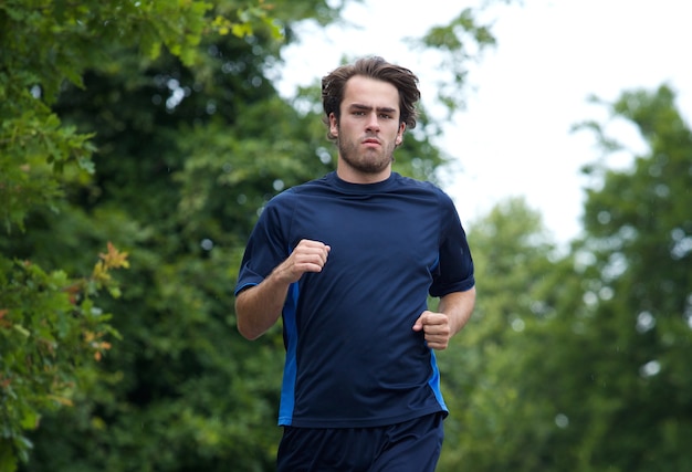 Young man jogging outdoors