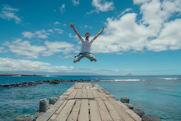 Photo young man jumping on galapagos pier