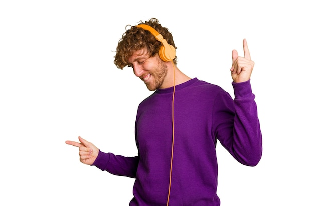 Young man listening to music with headphones