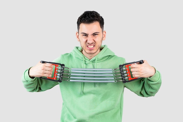 Young man model using sport equipment