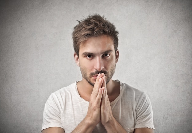 Young man praying