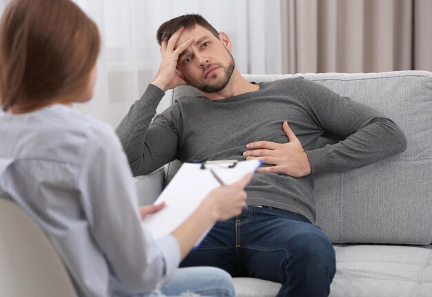 Young man on reception for family psychologist