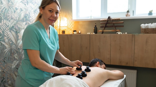 Young man relaxed in spa center