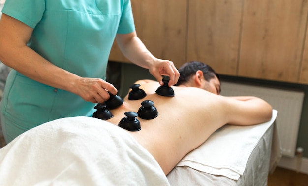 Young man relaxed in spa center