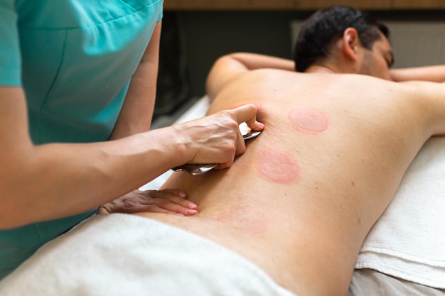 Young man relaxed in spa center