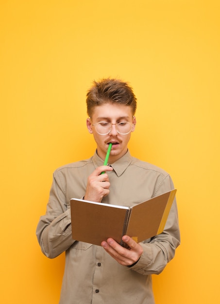 Young man in shirt and glasses isolated