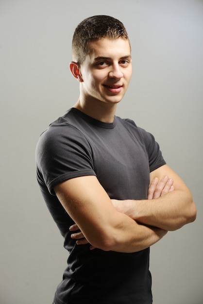 Young man short hair in white t-shirt portrait