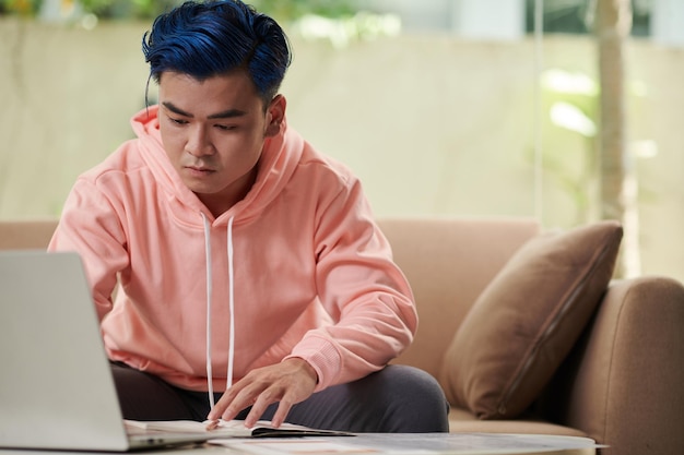 Young Man Studying Online