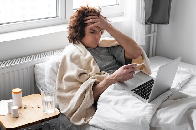 Young man talking to a doctor online