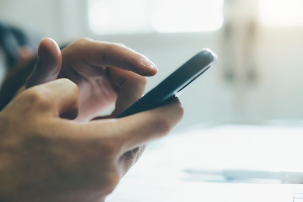 young man using mobile phone