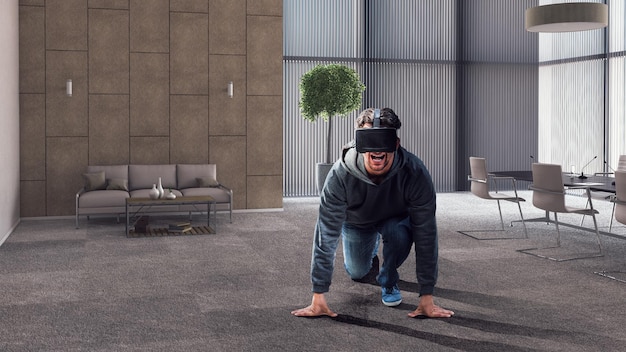 Young man in VR headset on start ready position in office room. Mixed media