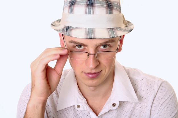 A young man in  on a white background