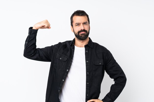 Photo young man with beard over isolated  doing strong gesture