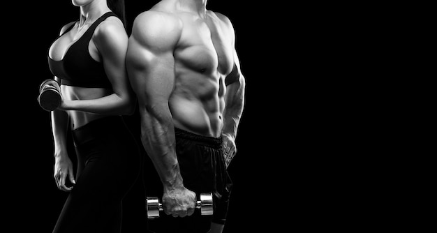 Young man with muscular torso and sporty woman on black background, cropped photo