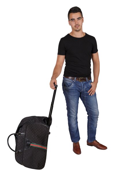 Photo young man with a suitcase on white background